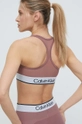 Sportski grudnjak Calvin Klein Performance Glavni materijal: 73% Poliester, 27% Elastan Podstava: 84% Poliester, 16% Elastan Umeci: 77% Poliamid, 23% Elastan Uložak: 100% Poliester