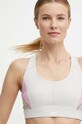 Спортивний бюстгальтер Reebok Lux Racer бежевий 100076162