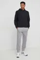 Bombažen pulover New Balance črna