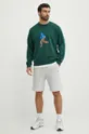 Bombažen pulover New Balance zelena
