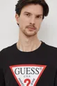 Bavlnené tričko s dlhým rukávom Guess čierna