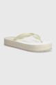 Calvin Klein Jeans japonki BEACH SANDAL FLATFORM MONOLOGO platforma beżowy YW0YW01617