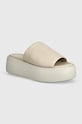 Calvin Klein klapki skórzane FLATFORM SLIDE LTH 5-8 cm beżowy HW0HW01943