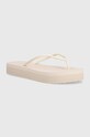 Calvin Klein japonki FLATFORM FF DEBOSS LOGO TPU platforma beżowy HW0HW01977