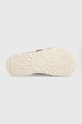 Semišové pantofle UGG Goldencoast Strap Slide 1142730.SSNT béžová