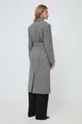 Шерстяное пальто Karl Lagerfeld Основной материал: 50% Переработанная шерсть, 40% Акрил, 5% Полиэстер, 5% Другой материал Подкладка: 53% Ацетат, 47% Вискоза