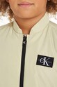 Дитяча безрукавка Calvin Klein Jeans IB0IB02085.PPYH бежевий