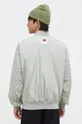 Куртка-бомбер Tommy Jeans Основной материал: 100% Полиэстер Резинка: 98% Полиэстер, 2% Эластан