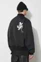 Y-3 bomber jacket Team Jacket Insole: 100% Recycled polyester Filling: 100% Recycled polyester Main: 100% Polyamide Pocket lining: 100% Cotton Rib-knit waistband: 58% Acrylic, 28% Wool, 10% Recycled polyester, 4% Elastane