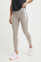 Reebok legginsy do biegania z elastanem beżowy 100076060