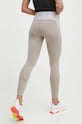 Odzież Reebok legginsy do biegania 100076060 beżowy