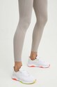 Reebok legginsy do biegania beżowy 100076060