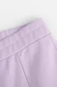 fioletowy Coccodrillo spodnie bawełniane dziecięce