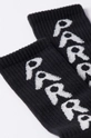 by Parra socks Hole Logo Crew Socks 63% Cotton, 27% Acrylic, 9% Polyester, 1% Spandex