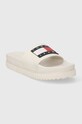 Παντόφλες Tommy Jeans TJW ELEVATED FLATFORM SLIDE EN0EN02451 μπεζ SS24