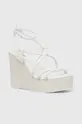 Usnjeni sandali Calvin Klein WEDGE bela