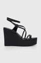 Δερμάτινα σανδάλια Calvin Klein WEDGE πλατφόρμα μαύρο HW0HW01952