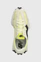 yellow New Balance sneakers 327