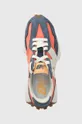 orange New Balance sneakers 327