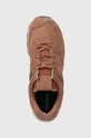 brown New Balance suede sneakers 574