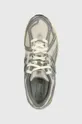 gray New Balance sneakers 1906