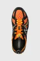 orange New Balance shoes 610v1