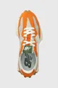 orange New Balance sneakers 327