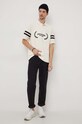 Бавовняне поло Tommy Hilfiger MW0MW33588 бежевий SS24