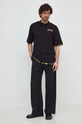 Бавовняне поло Versace Jeans Couture 76GAG625.J0003 чорний SS24