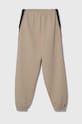 Calvin Klein Jeans spodnie dresowe dziecięce IB0IB01931.PPYH beżowy SS24