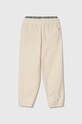Dětské bavlněné tepláky Tommy Hilfiger KB0KB08700.PPYH béžová SS24