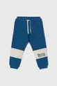 niebieski United Colors of Benetton spodnie dresowe bawełniane dziecięce Chłopięcy