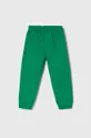 зелений Дитячі бавовняні штани United Colors of Benetton Для хлопчиків