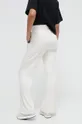 Παντελόνι φόρμας DKNY μπεζ