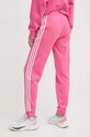 Одежда Спортивные штаны adidas IS3942 розовый