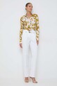 Versace Jeans Couture spodnie 76HAA111 beżowy SS24