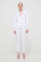 Versace Jeans Couture spodnie dresowe bawełniane 76HAAT02.CF01T biały SS24
