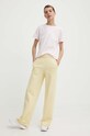 Памучен спортен панталон adidas Originals Essentials+ IR6020 жълт SS24