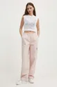 Bombažne hlače Calvin Klein Jeans roza