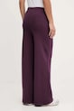 Odzież Puma spodnie dresowe bawełniane BETTER CLASSIC 624235 fioletowy