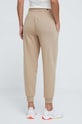 Odzież Puma spodnie dresowe 678744 beżowy