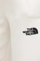 beżowy The North Face spodnie dresowe