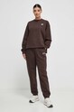 New Balance spodnie dresowe WP33513KCF WP33513KCF brązowy SS24