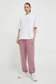 New Balance spodnie dresowe WP41508RSE różowy