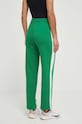 Odzież Puma spodnie dresowe ICONIC T7 625411 zielony