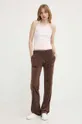 Juicy Couture spodnie dresowe welurowe brązowy