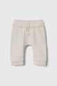 United Colors of Benetton spodnie dresowe niemowlęce z elastanem beżowy 3NDKAF01M.W.Seasonal