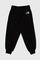 The North Face spodnie dresowe bawełniane dziecięce OVERSIZED JOGGERS NF0A89PE czarny SS24
