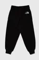 The North Face pantaloni tuta in cotone bambino/a OVERSIZED JOGGERS nero