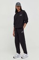 Bavlněné tepláky Tommy Jeans DM0DM18356 černá SS24